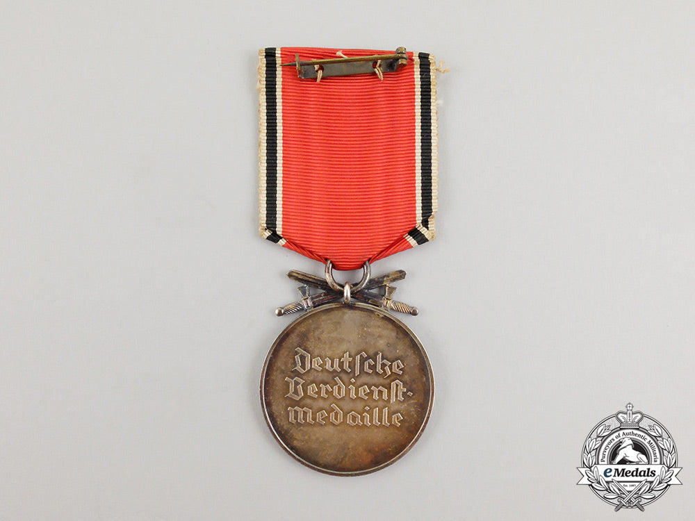 a_german_eagle_order_merit_medal_with_swords;_published_example_with_case_cc_5094