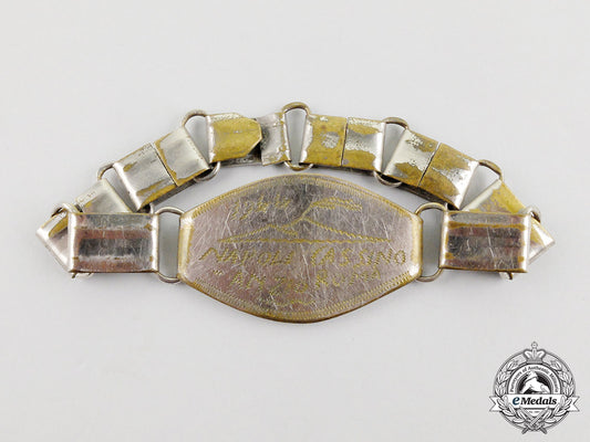 a_bracelet_belonging_to_a_member_of_the_first_special_service_force;_dated1944_cc_5198