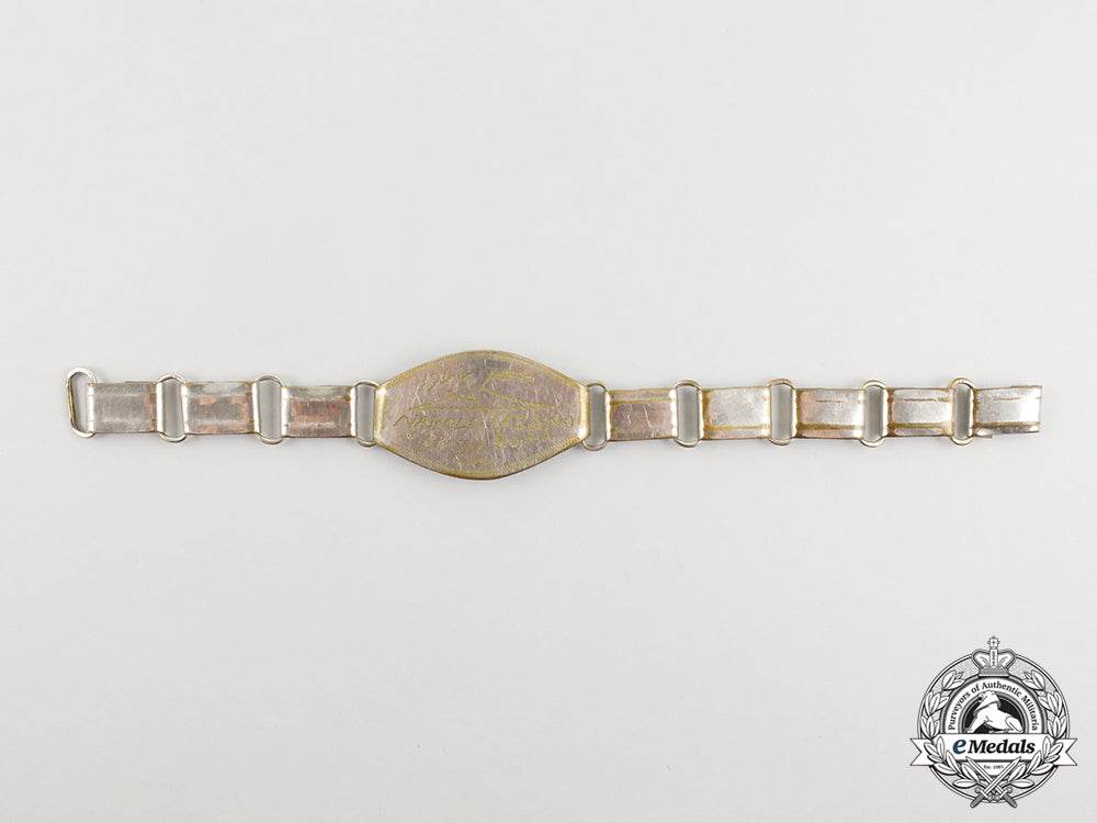 a_bracelet_belonging_to_a_member_of_the_first_special_service_force;_dated1944_cc_5199