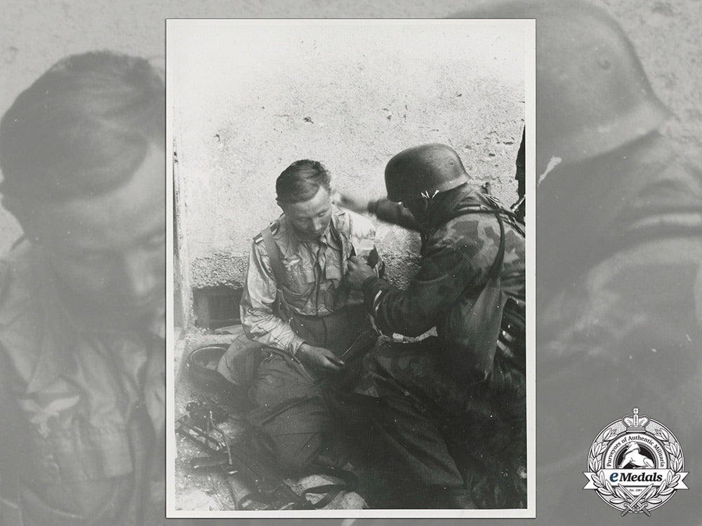 an_official_wartime_propaganda_photo_with_wounded_luftwaffe_nco_cc_5706_1