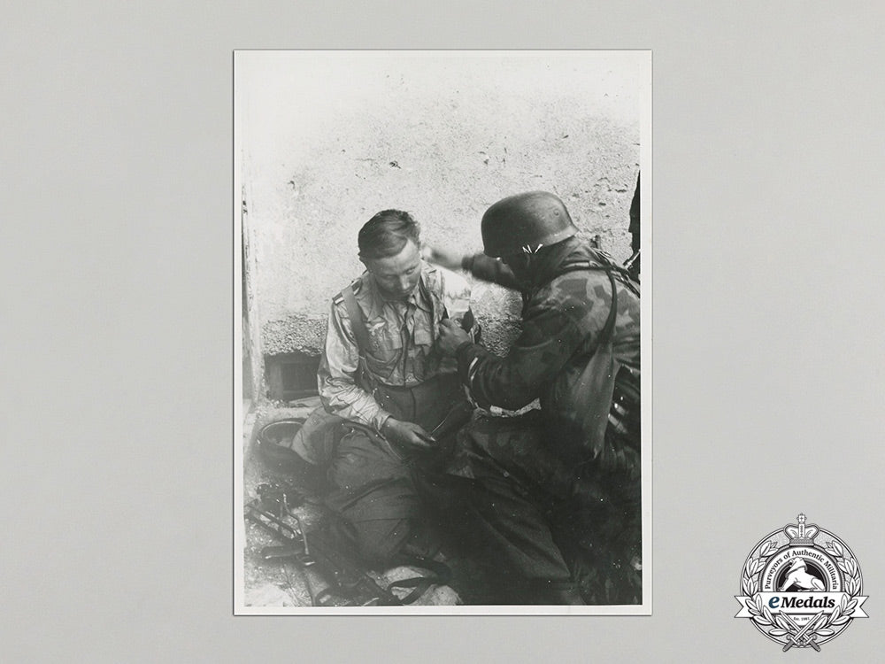 an_official_wartime_propaganda_photo_with_wounded_luftwaffe_nco_cc_5707_1