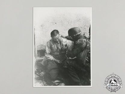 an_official_wartime_propaganda_photo_with_wounded_luftwaffe_nco_cc_5707_1