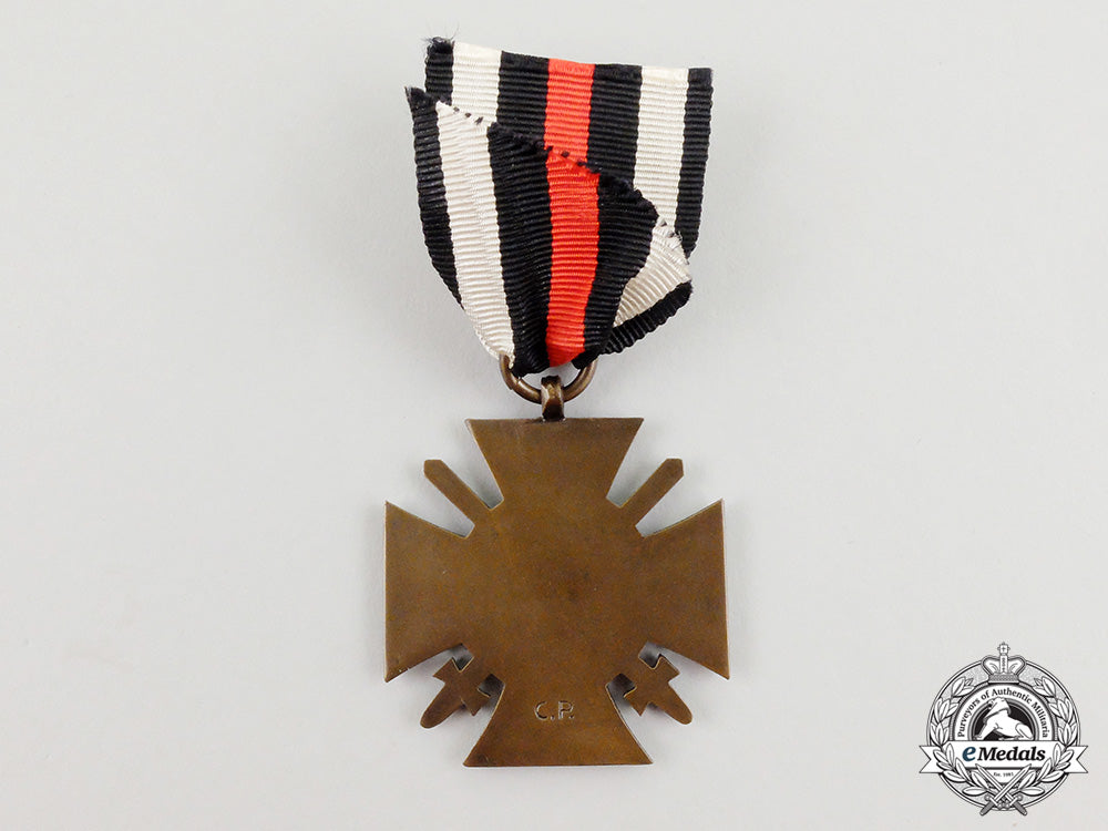 a_mint_honour_cross_of_the_world_war1914/18(_hindenburg_cross)_by_poellath_in_its_packet_cc_5845_1