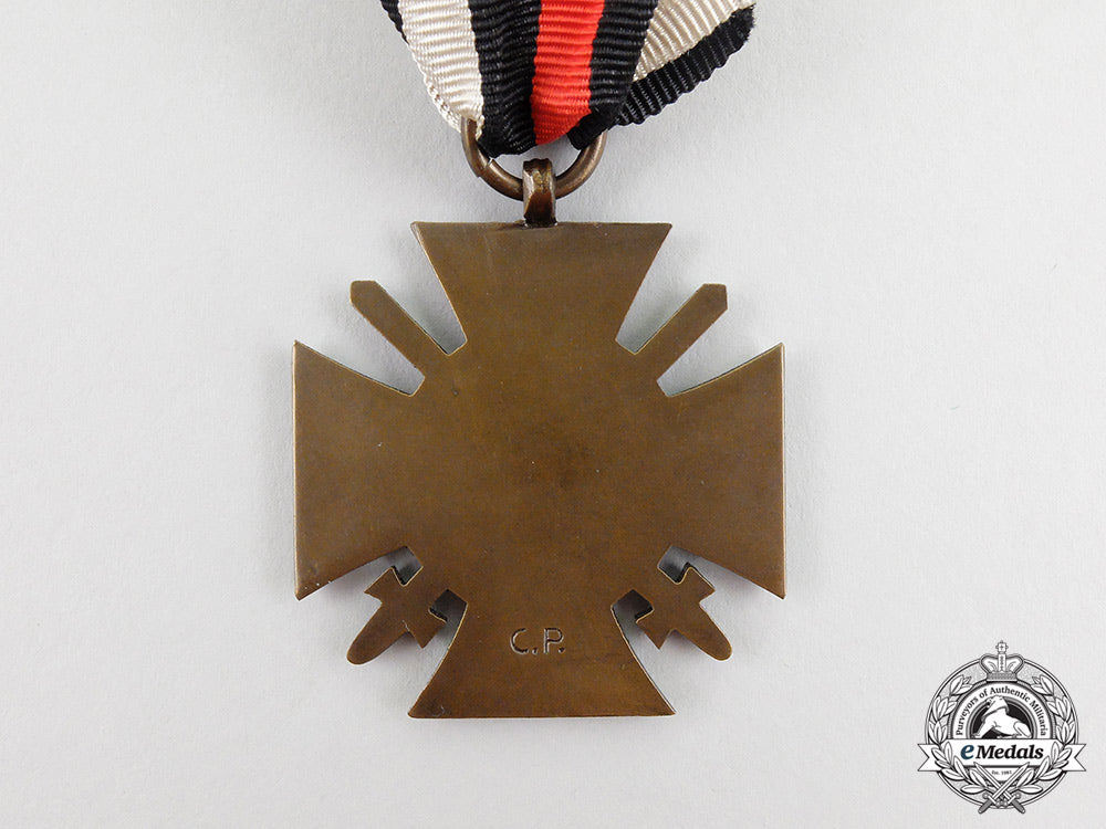 a_mint_honour_cross_of_the_world_war1914/18(_hindenburg_cross)_by_poellath_in_its_packet_cc_5846_1