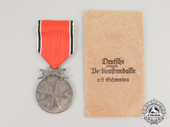 Germany, Third Reich. An Order Of The German Eagle, Silver Merit Medal With Swords
