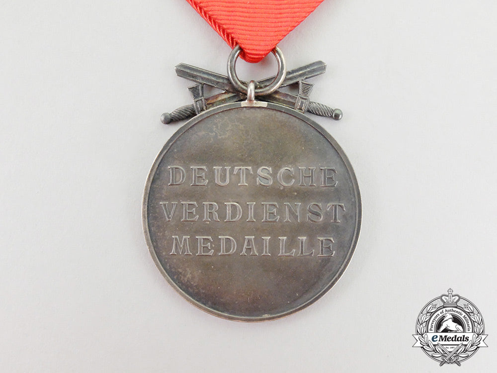 germany,_third_reich._an_order_of_the_german_eagle,_silver_merit_medal_with_swords_cc_5864