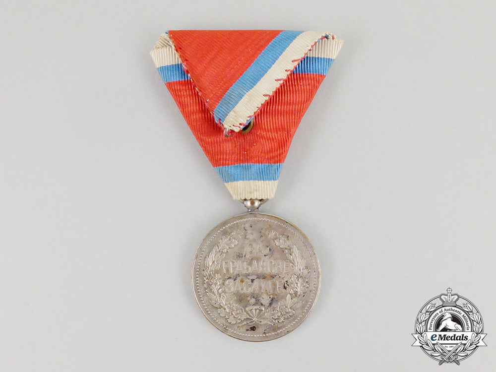 a_first_war_period_serbian_medal_for_civil_merit;_second_class_in_case_of_issue_cc_6521