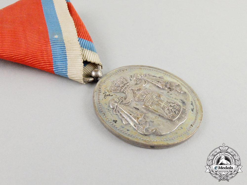 a_first_war_period_serbian_medal_for_civil_merit;_second_class_in_case_of_issue_cc_6522