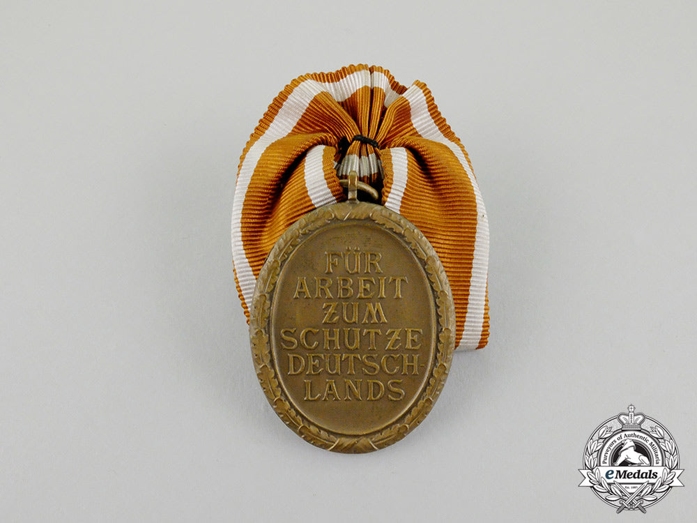 a_court_mounted_third_reich_period_german_defence_wall(_west_wall)_medal_cc_7196