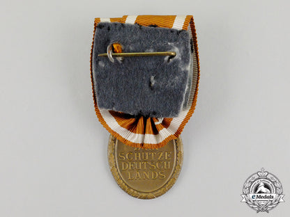 a_court_mounted_third_reich_period_german_defence_wall(_west_wall)_medal_cc_7197