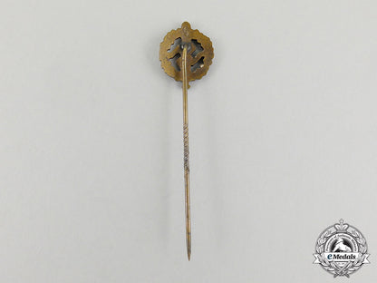 a_bronze_grade_sa_sports_badge_with_its_matching_stick_pin_cc_7380