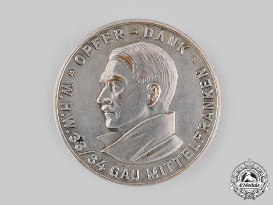 germany,_third_reich._a_winterhilfswerk_donor_appreciation_badge_by_paulmann&_crone_ci19_0957