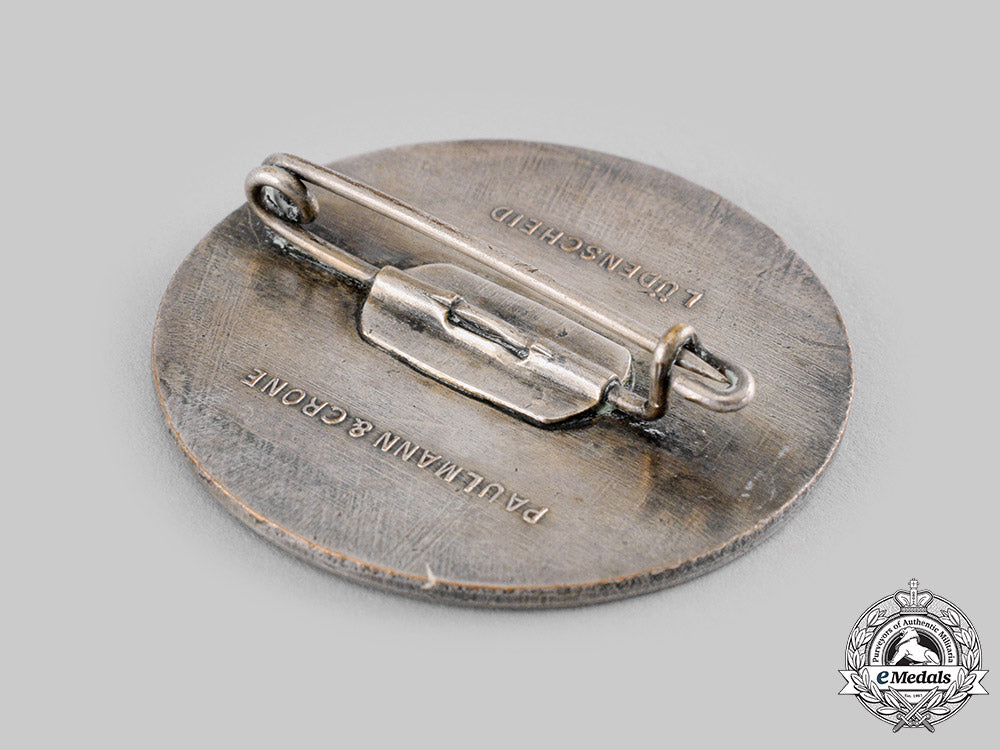 germany,_third_reich._a_winterhilfswerk_donor_appreciation_badge_by_paulmann&_crone_ci19_0959