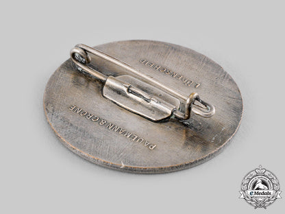 germany,_third_reich._a_winterhilfswerk_donor_appreciation_badge_by_paulmann&_crone_ci19_0959