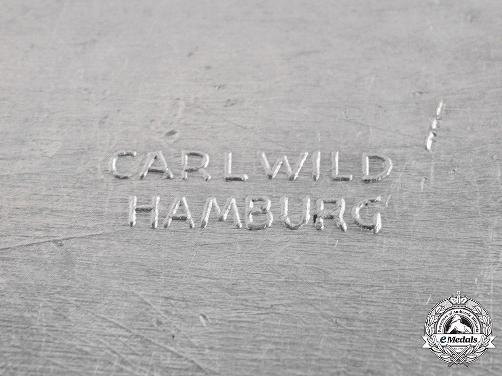 germany,_third_reich._a1936/1937_winterhilfswerk_campaign_badge_by_carl_wild_ci19_0968