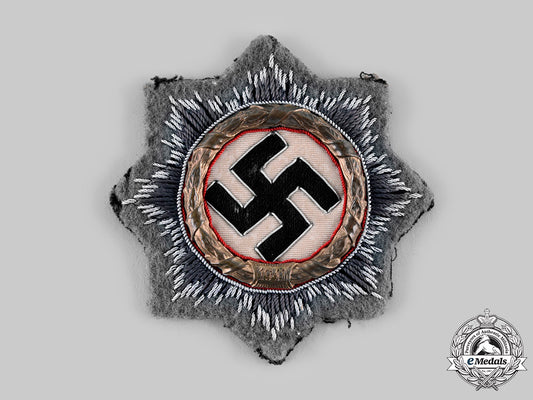 germany,_wehrmacht._a_german_cross_in_gold,_cloth_version_ci19_1139_1_1