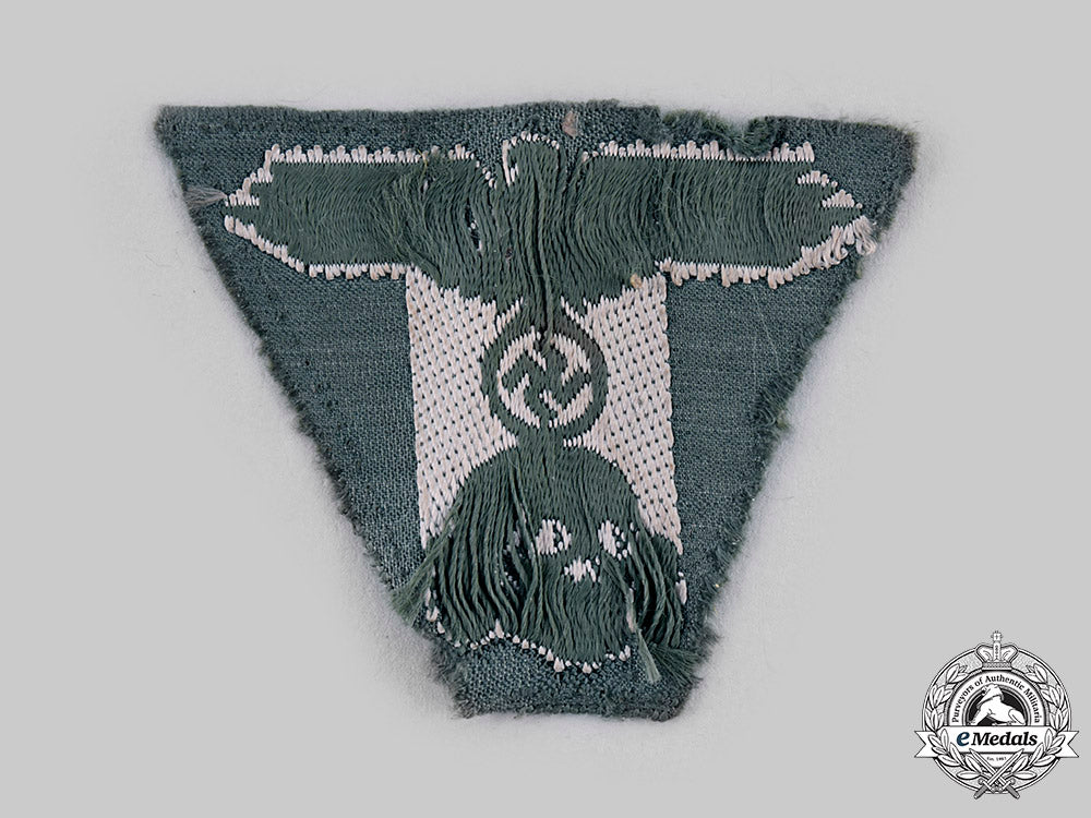 germany,_ss._a_m43_cap_eagle_and_skull_insignia_ci19_1330_1