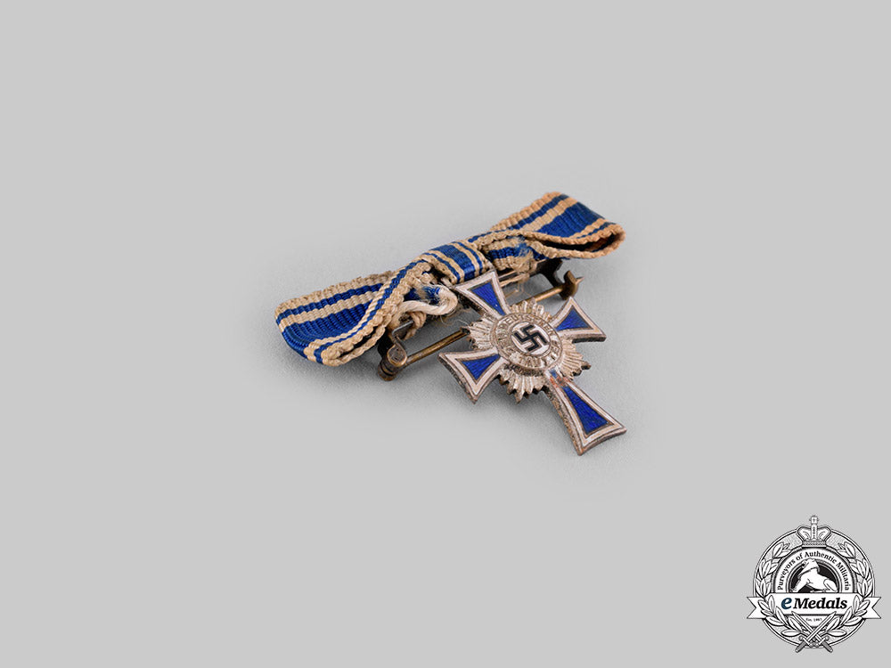 germany,_third_reich._an_honour_cross_of_the_german_mother,_silver_grade,_with_miniature_ci19_1768