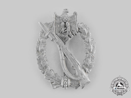 germany,_wehrmacht._an_infantry_assault_badge,_silver_grade,_by_e._ferdinand_wiedmann_ci19_2626_1