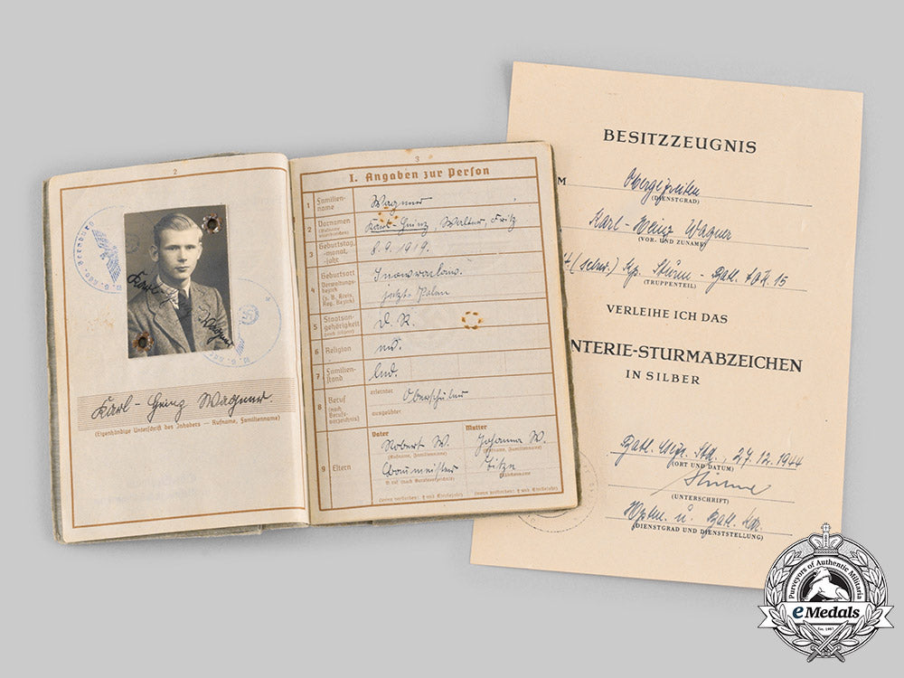 germany,_heer._a_wehrpass&_award_documents_to_obergefreiter_karl-_heinz_wagner_ci19_2753_2