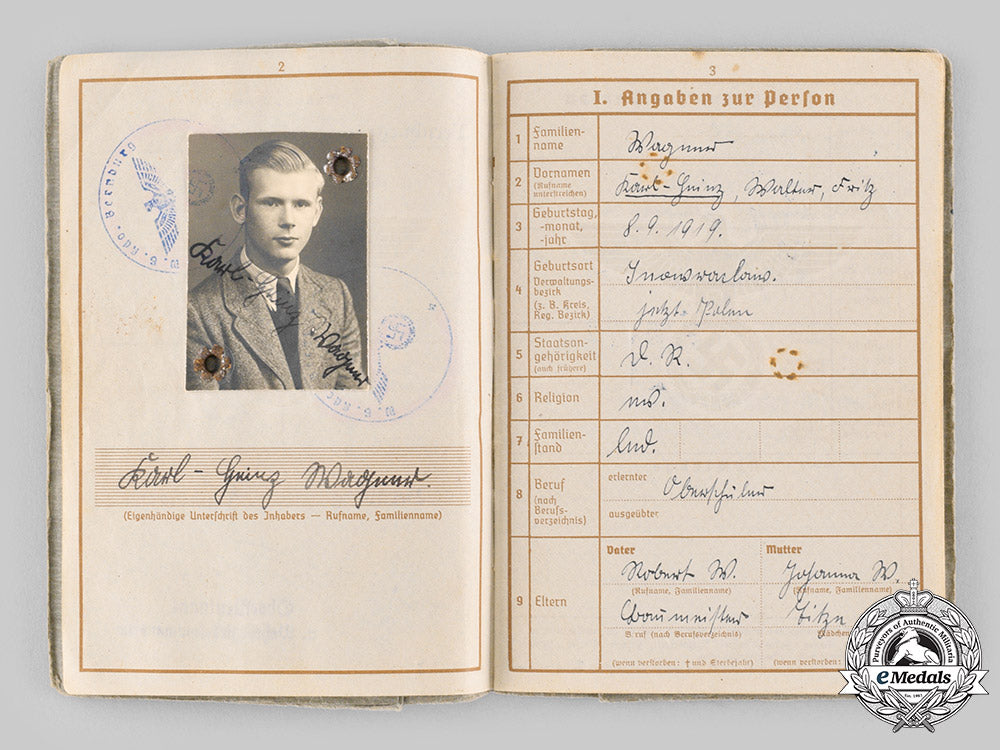 germany,_heer._a_wehrpass&_award_documents_to_obergefreiter_karl-_heinz_wagner_ci19_2756_2