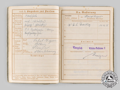 germany,_heer._a_wehrpass&_award_documents_to_obergefreiter_karl-_heinz_wagner_ci19_2757_2