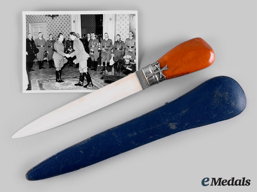 germany,_third_reich._an_amber_paper_knife_with_case,_by_the_state_amber_manufactory,_from_the_estate_of_ss-_obergruppenführer_arthur_seyss-_inquart_ci19_3556_1