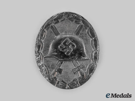 germany,_wehrmacht._a_wound_badge,_silver_grade,_by_b.h._mayer_ci19_3669_1_1