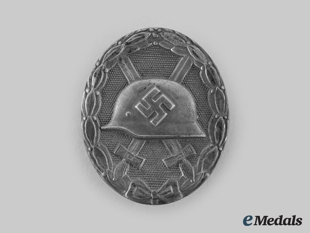 germany,_wehrmacht._a_wound_badge,_silver_grade,_by_b.h._mayer_ci19_3673_1