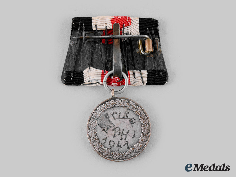 germany,_heer._a_lot_of_photographs_and_decorations_to_a_member_of_panzer-_aufklärungsabteilung33,_afrika_korps_ci19_4042_1
