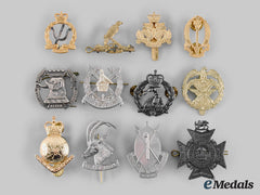 Australia, Hong Kong, Kuwait, New Zealand, Rhodesia, Zaire, Zimbabwe. A Lot Of Twelve Cap Badges