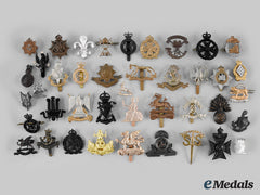 United Kingdom. A Lot Of Forty-One Cap And Collar Badges