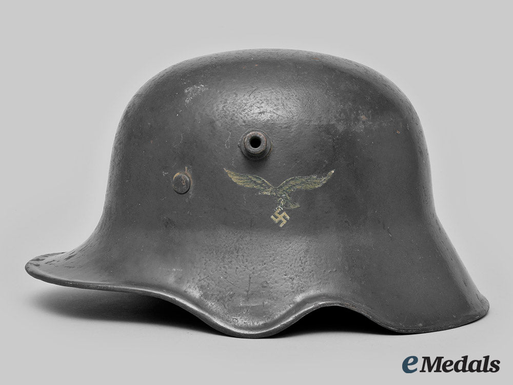 germany,_luftwaffe._an_m18_transitional_luftwaffe_ear_cut_out_helmet_ci19_4940_1