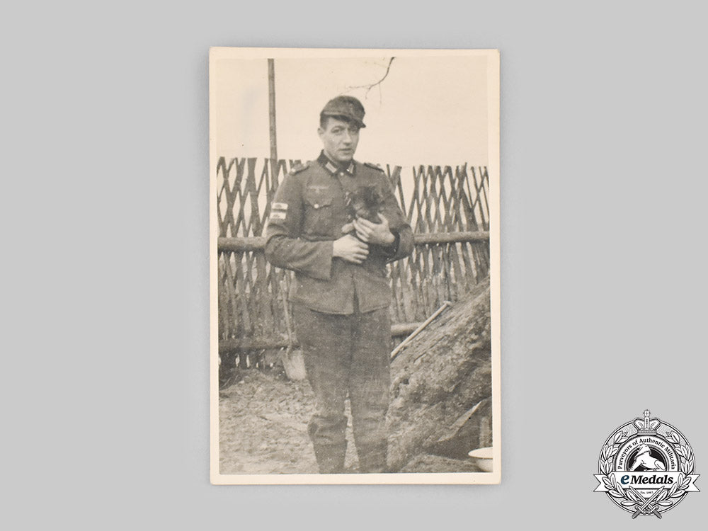 germany,_wehrmacht._a_field_photograph_of_a_wehrmacht_nco_with_tank_destruction_badges_ci19_5431