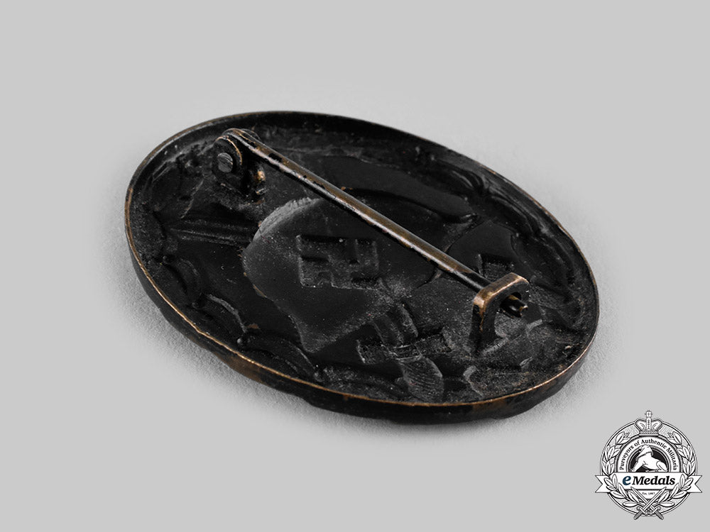 germany,_wehrmacht._a_wound_badge,_black_grade,_with_award_document_to_fritz_mengel_ci19_6109