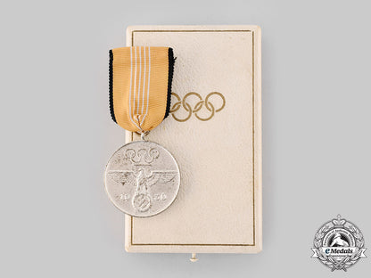 germany,_third_reich._a_german_olympic_commemorative_medal_with_case_ci19_7142