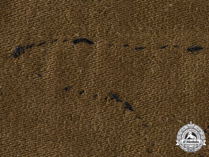 germany,_ss._a_ss_officer’s_sleeve_eagle,_belsen_uniform_removed_ci19_7356