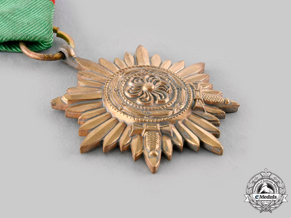 germany,_wehrmacht._an_eastern_people’s_medal,_ii_class_in_gold_with_swords,_by_wächtler&_lange_ci19_8249
