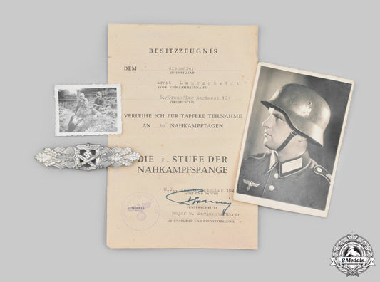 germany,_heer._a_silver_grade_close_combat_clasp_with_award_document_and_photos,_to_ernst_langscheidt_cic_2021_230_mnc9409