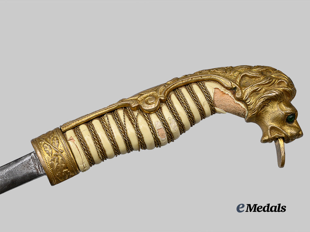 germany,_imperial._a_letter_opener,_with_lion_head_pommel_e_medals__g62633_5