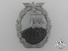 A Kriegsmarine Naval Auxiliary Cruiser War Badge By Foerster & Barth Design