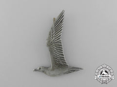 A Dutch “De Nationale Jeugdstorm (Njs)” Cap Badge