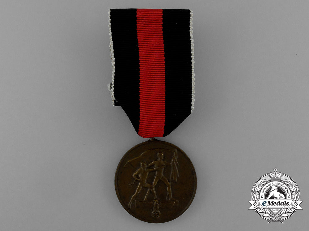 a_commemorative_austrian_anschluss_medal_in_its_original_packet_of_issue_d_0019_3