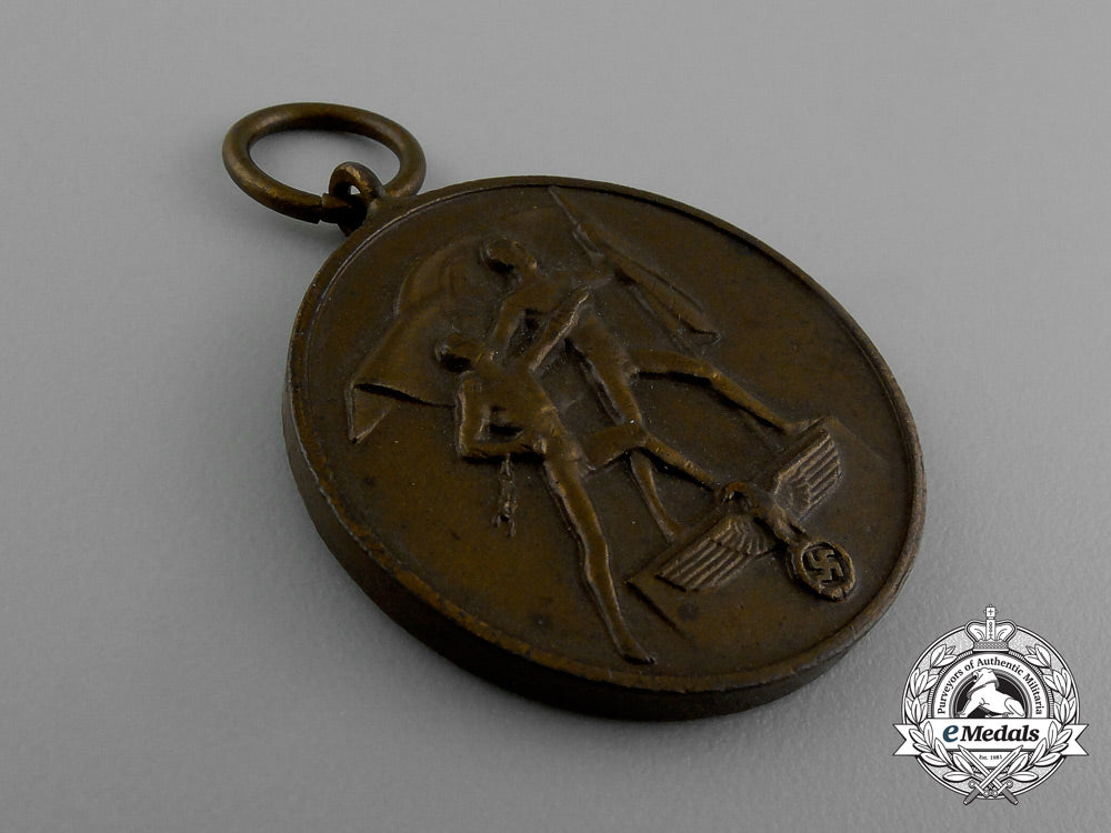 a_commemorative_austrian_anschluss_medal_in_its_original_packet_of_issue_d_0023_3