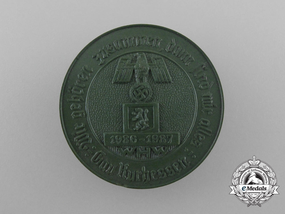 germany._a1937_winter_relief_of_the_german_people“_we_belong_together;_then_we_are_one”_badge_d_0116_1