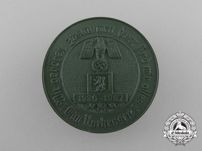 germany._a1937_winter_relief_of_the_german_people“_we_belong_together;_then_we_are_one”_badge_d_0116_1