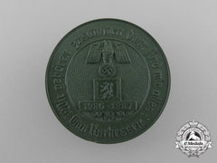 Germany. A 1937 Winter Relief Of The German People “We Belong Together; Then We Are One” Badge