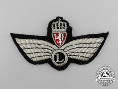 A Royal Norwegian Air Force (Rnaf) (L) Cap Badge