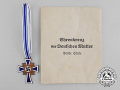 A Bronze Grade Mother’s Cross With Original Packet Of Issue