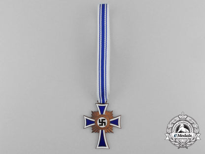 a_bronze_grade_mother’s_cross_with_original_packet_of_issue_d_0211